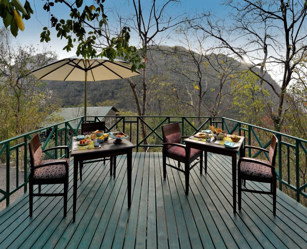 Have a meal or read a book while surrounded by the tree canopies and hills